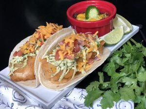 Beer Battered Fish Tacos with Avocado Cilantro Slaw